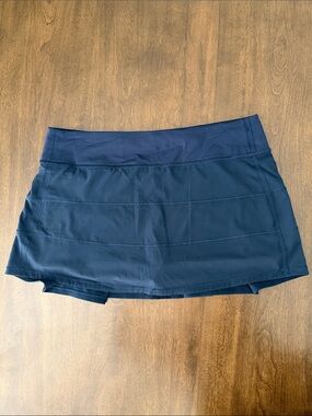 lululemon athletica Pace Rival mid rise navy pleated skort size 10